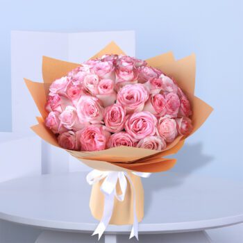 pink roses in brown wrap