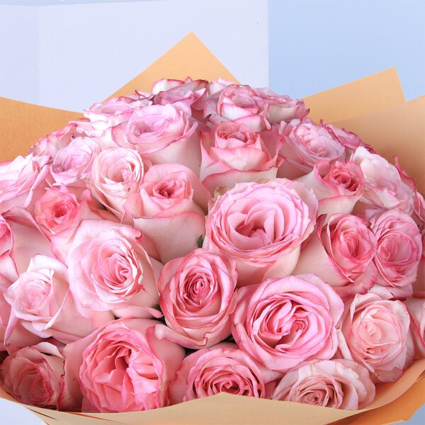 pink roses in brown wrap