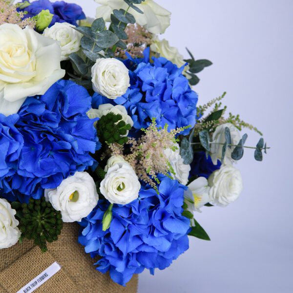 Azure and Ivory flower box by Black Tulip Flowers