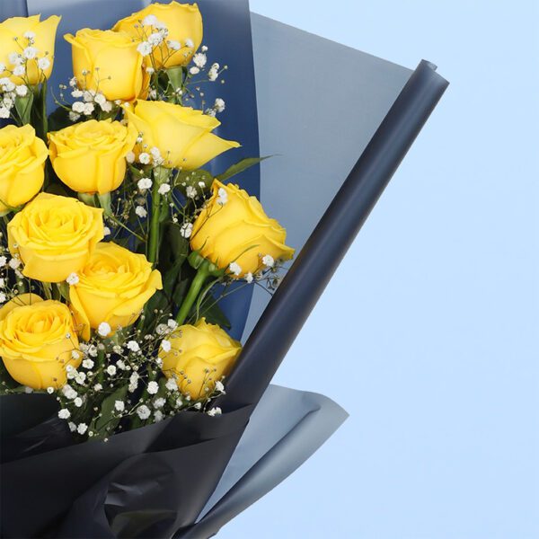 Yellow Roses in Black Wrap