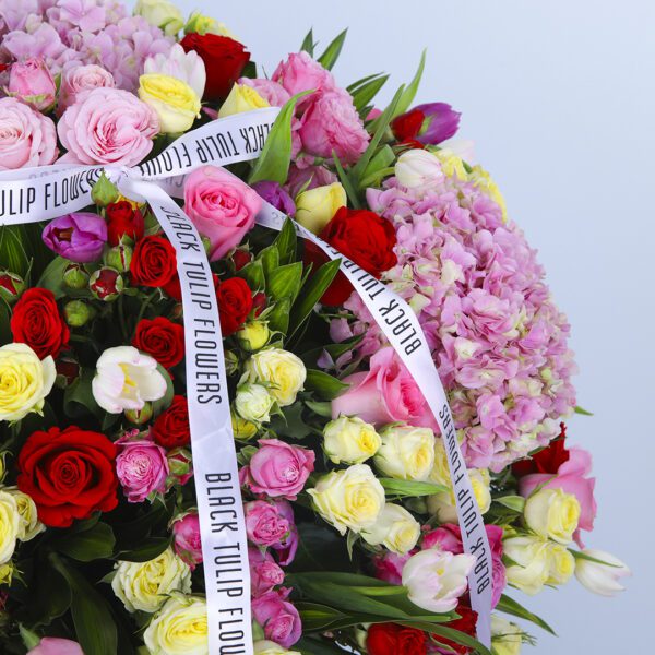 Oversized Basket Filled with Pink Hydrangeas, Mixed-Color Roses, and Greenery