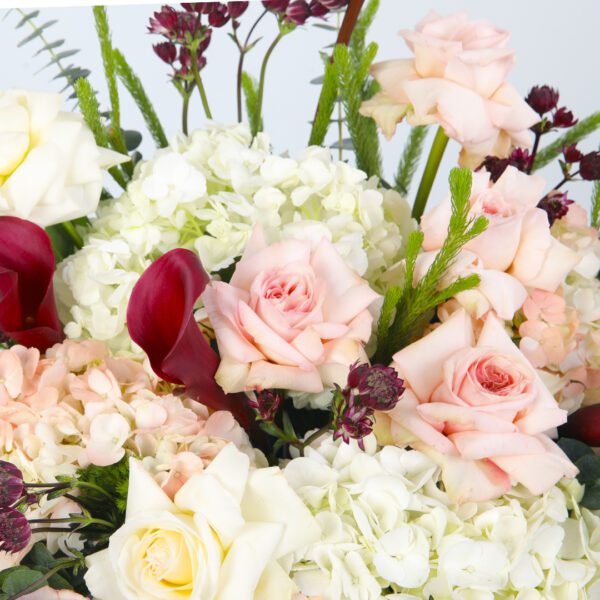 Elegant Bouquet of Peach Roses and White Hydrangeas Presented in a Black Hat Box